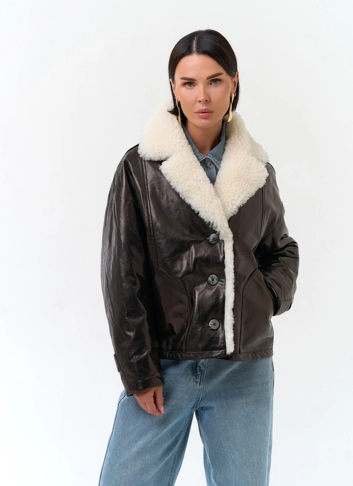 Пуховик из натуральной кожи с английским воротником фото